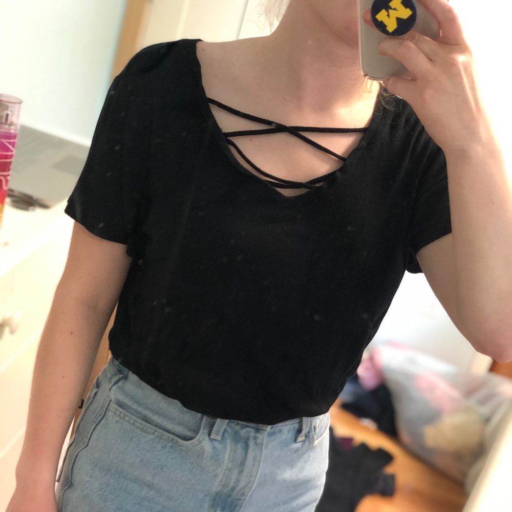 Black top with crisscrossing front